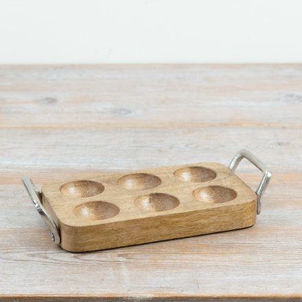 A charming wooden egg tray complete with two rustic silver handles.