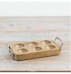 A charming wooden egg tray complete with two rustic silver handles.