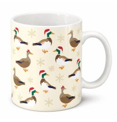 A charming xmas mug with adorable, repeating illustration of festive ducks dressed up in Santa hats 