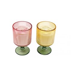 beautiful assorted candles in ribbed glass vessels with sage green bases