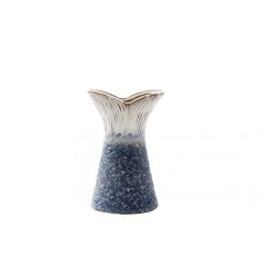 A charming porcelain vase inspired by the graceful silhouette of a fish tail
