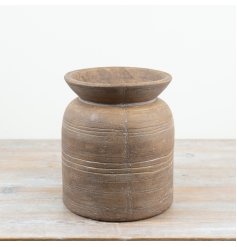a charming terracotta churn style vase 