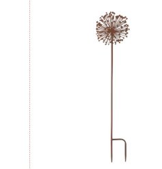 A distressed metal stake for the garden featuring a dandelion design.