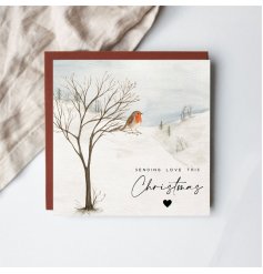 A whimsical watercolor illustration showing a charming red-breasted robin in a snowy landscape.