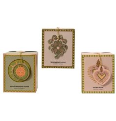 A rich, earthy, and grounding aroma housed in a clover-themed gift box.