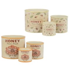 a charming set of 3 planters and canister 