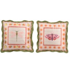 a charming colurful dragon fly and moth sofa cushion 
