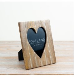 Display your treasured memories elegantly with this charming heart frame