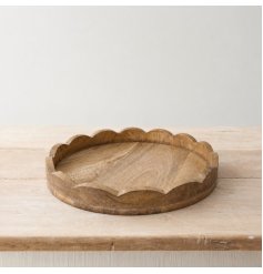 a stunning round mango wood tray 