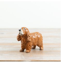 A delightful glazed cocker spaniel with waggy tail, perfect for country homes
