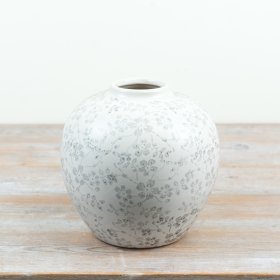 beautiful white floral vase with delicate patterns