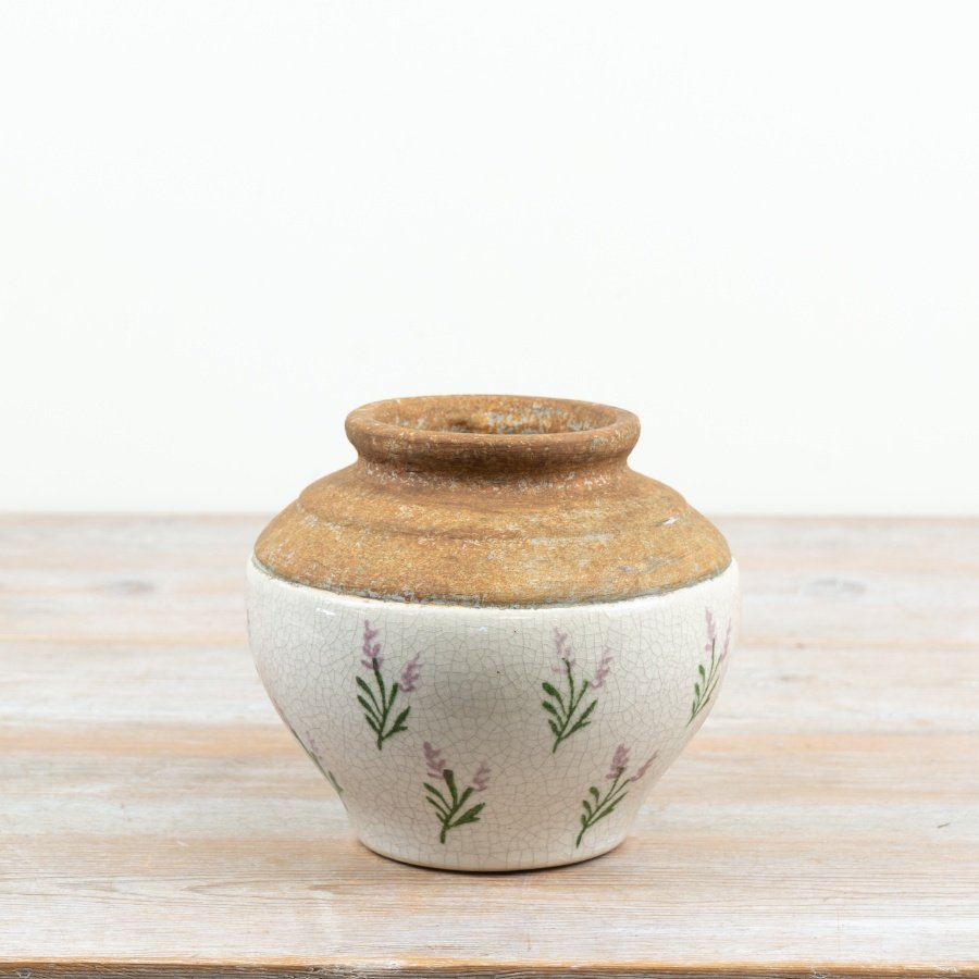 Elegant vase featuring a delicate floral motif