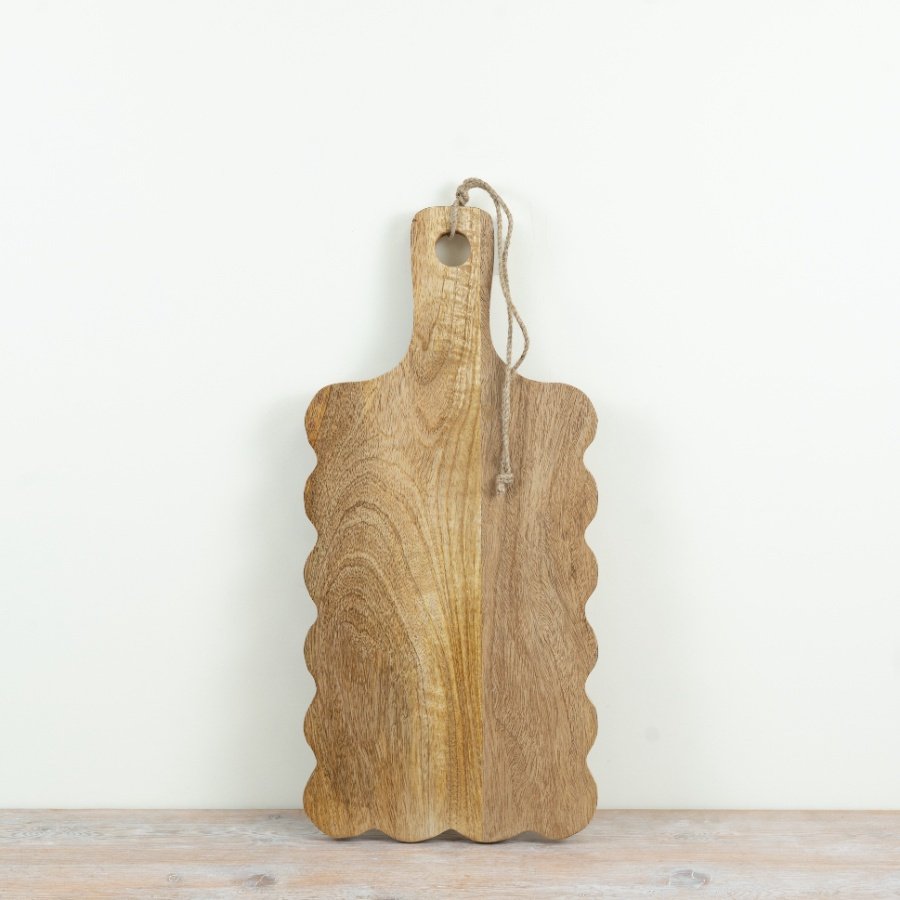 Elegant scalloped edge chopping board ideal for all your food preparation and serving needs