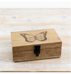 a charming rustic keepsake box with intricate butterfly engraving