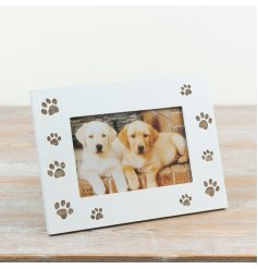 a simple picture frame with paw prints 