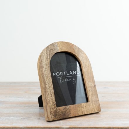 a stunning freestanding wooden arch frame