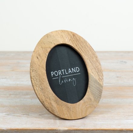 Elegant oval shape softens sharp angles on shelves or desks.