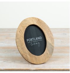 Elegant oval shape softens sharp angles on shelves or desks.