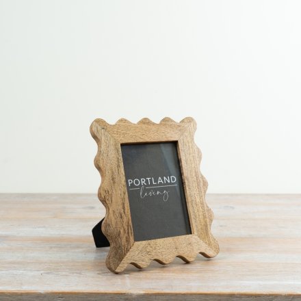 a stunning wooden freestanding wavy frame 