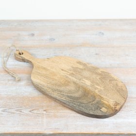 A warm, natural-finish board for food preparation and laid-back rustic serving