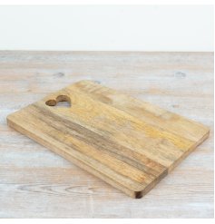 a stunning serving board with a heart cut out shape 