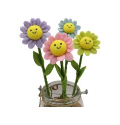 Delightful plush flower with a joyful face, offered in four vibrant colours