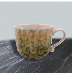 Enjoy your favourite hot beverage in this beautifully crafted ceramic mug with a unique reactive glaze