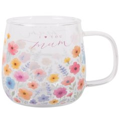 Show your love with this elegant glass mug decorated with daisies and a tender heart