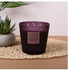 A generously sized candle infused with calming lavender aroma for a tranquil atmosphere