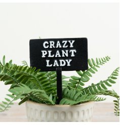 a rustic cast iron plant marker sign 