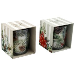 A seasonal candle in a delightfully decorated box, ready to give as a festive gift