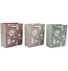 Lovely small gift bags with floral and gingham prints, ideal for adding a finishing touch to your presents