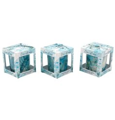 Elegant seaside-inspired glass candle in a decorative box, perfect for adding a calming coastal touch.