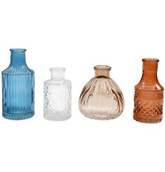 Charming set of four textured glass vases with a coastal-inspired aesthetic