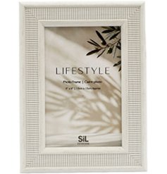Elegant white photo frame with a textured rib design, perfect for showcasing cherished memories