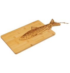 Stylish bamboo board ideal for chopping and presenting food with a playful fish motif