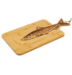 Robust bamboo board with an enchanting fish motif ideal for both chopping and presenting food