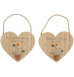 a charming heart design hanging plaque 