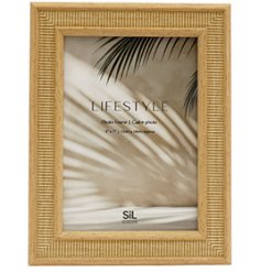 Elegant 5x7" photo frame with ribbed detailing, crafted from durable materials for a timeless display.