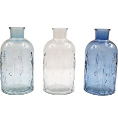 Charming glass vases with a soothing fish spray pattern, perfect for seaside-inspired interiors