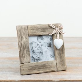 Crafted from distressed wood, this square frame adds a warm, cottage-style feel to any room