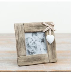 Handcrafted from distressed wood, this square picture frame brings an instant touch of cozy cottage charm