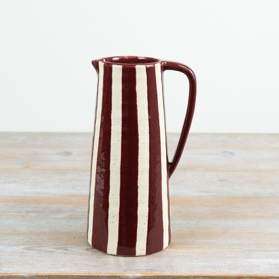 Use it to serve water or wine, store kitchen utensils or display dried flowers
