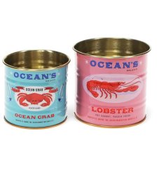 Retro-inspired ocean motif tins to organise your space with a coastal touch