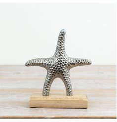 This freestanding statement ornament captures the elegant profile of classic coastal design.